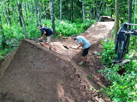 how to build mountain bike trails with a skid steer|mountain bike trail machines.